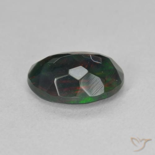 Ópalo negro Multicolor natural de 1.19 ct, Ovalada, Translúcido