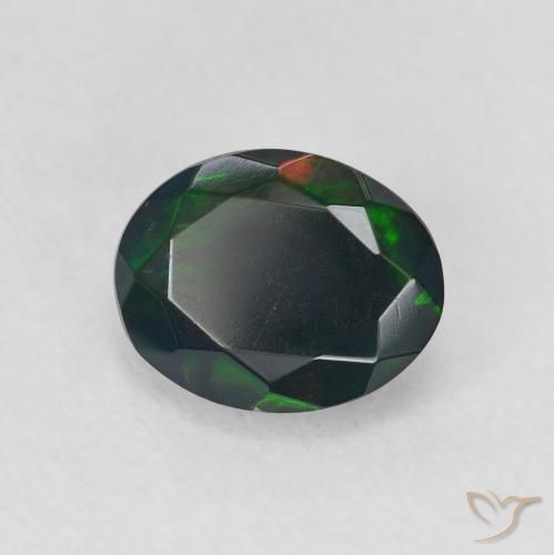 Ópalo negro Multicolor natural de 0.92 ct, Ovalada, Translúcido