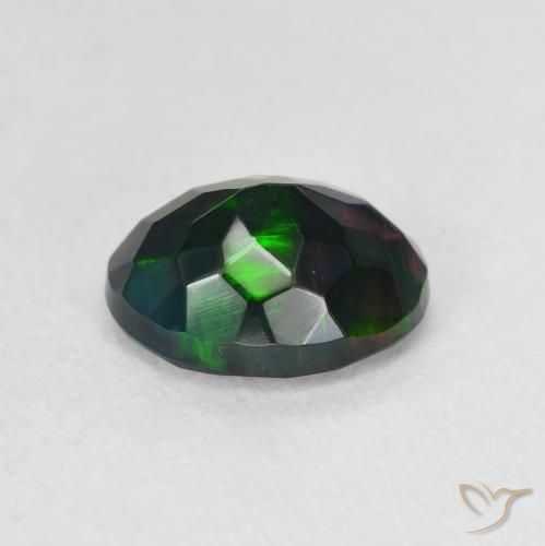 Ópalo negro Multicolor natural de 0.92 ct, Ovalada, Translúcido