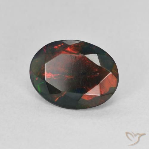 Ópalo negro Multicolor natural de 1.19 ct, Ovalada, Translúcido