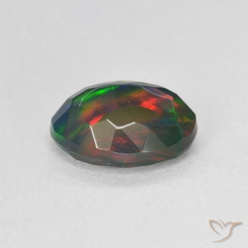 Ópalo negro Multicolor natural de 1.17 ct, Ovalada, Translúcido