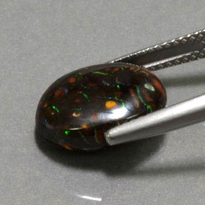 Ópalo boulder multicolor natural de 6,61 ct, corte óvalo, opaco