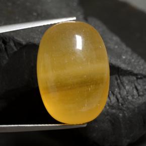 Calcita naranja natural de 40,17 ct, corte óvalo, translúcido