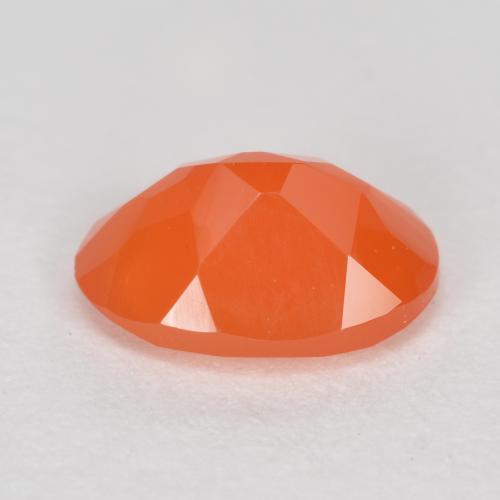 Cornalina naranja brillante natural de 0,72 ct, corte óvalo, translúcido