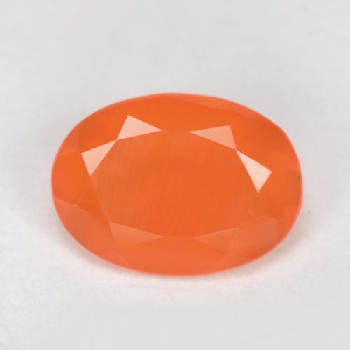 Cornalina naranja melocotón vívido natural de 0,64 ct, corte óvalo, translúcido