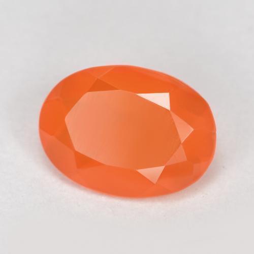 Cornalina naranja melocotón vívido natural de 0,64 ct, corte óvalo, translúcido