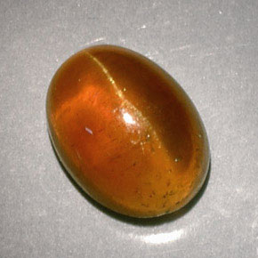 Apatita Ojo de Gato Naranja natural de 3.04 ct, Corte Óvalo, Translúcido