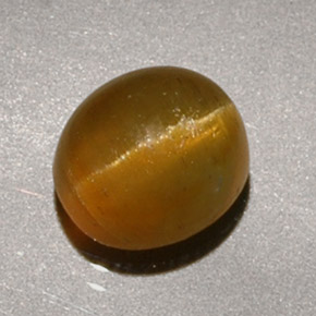 Cat's eye apatite amarillo natural de 1,90 ct, corte óvalo, translúcido