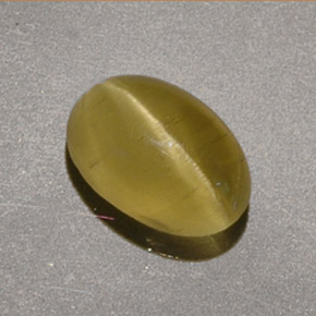Cat's eye apatite amarillo natural de 1,40 ct, corte óvalo, translúcido
