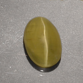 Cat's eye apatite amarillo natural de 1,40 ct, corte óvalo, translúcido