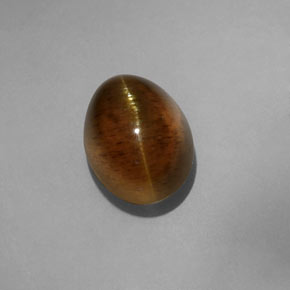 Apatita Ojo de Gato Dorado verdoso natural de 6.67 ct, Transparente, Transparente / Translúcido