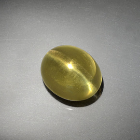 Apatita Ojo de Gato Verde dorado natural de 8.38 ct, Corte Óvalo, Transparente