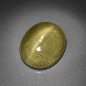 Apatita ojo de gato verde dorado natural de 5,46 ct, corte óvalo, translúcido