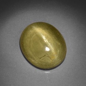 Apatita ojo de gato verde dorado natural de 5,46 ct, corte óvalo, translúcido