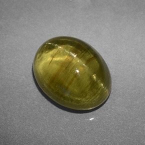 Apatita ojo de gato verde dorado natural de 3,66 ct, corte óvalo, translúcido