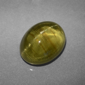 Apatita ojo de gato verde dorado natural de 3,66 ct, corte óvalo, translúcido