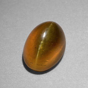 Apatita Ojo de Gato Dorado verdoso natural de 6.55 ct, Corte Óvalo, Translúcido