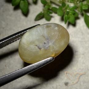 Ópalo ojo de gato Amarillo medio natural de 7.86 ct, Ovalada, Translúcido