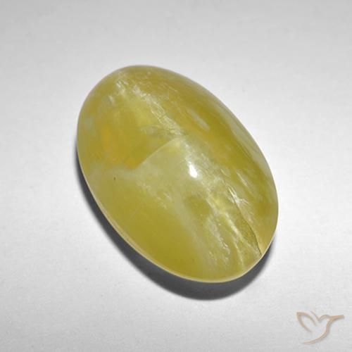 Ópalo ojo de gato Amarillo pálido natural de 5.90 ct, Ovalada, Translúcido