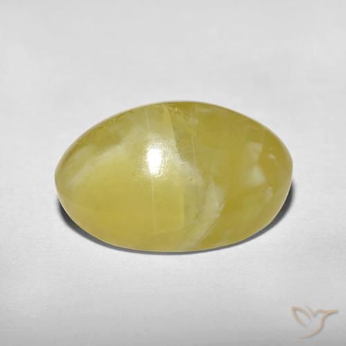 Ópalo ojo de gato Amarillo pálido natural de 5.90 ct, Ovalada, Translúcido