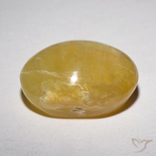Ópalo ojo de gato Amarillo medio natural de 6.21 ct, Ovalada, Translúcido