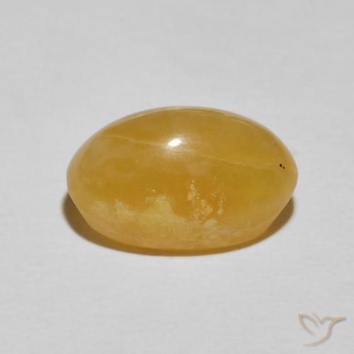 Ópalo ojo de gato Dorado medio natural de 4.84 ct, Ovalada, Opaco