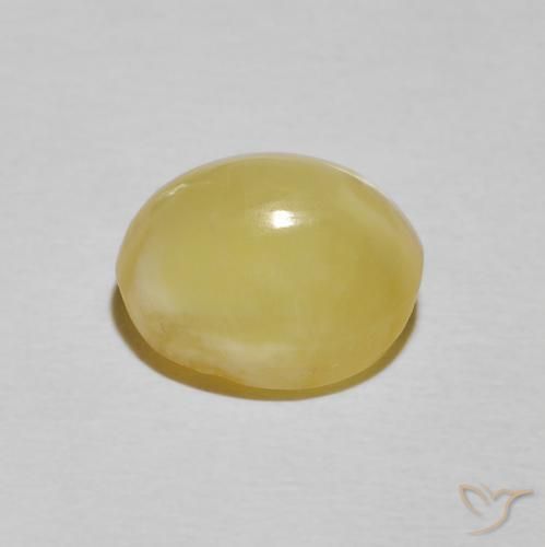 Ópalo ojo de gato Amarillo pálido natural de 3.43 ct, Ovalada, Opaco