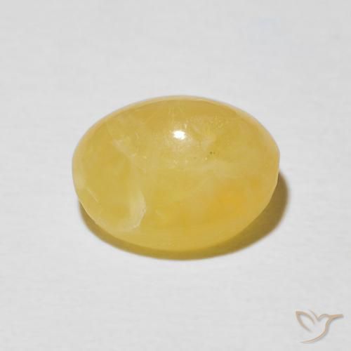 Ópalo ojo de gato Dorado medio natural de 3.13 ct, Ovalada, Opaco