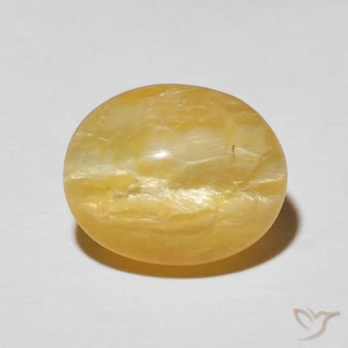 5.56ct Natural Naranja dorado Ópalo ojo de gato, Ovalada, Opaco