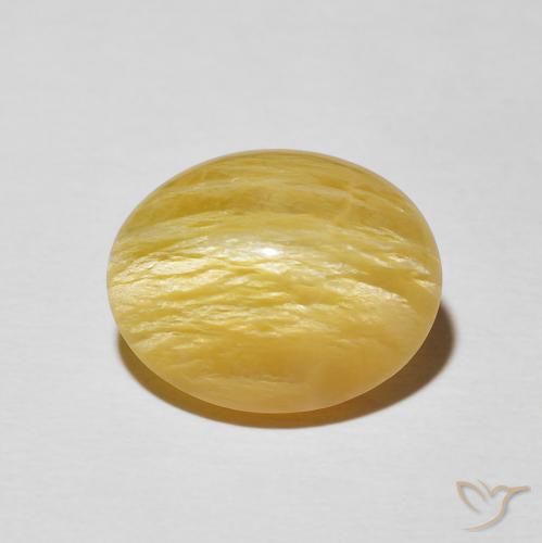 6.20ct Natural Naranja dorado Ópalo ojo de gato, Ovalada, Opaco