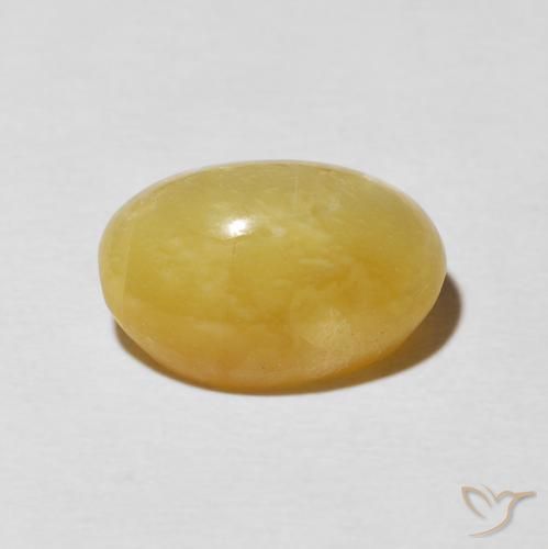 Ópalo ojo de gato Dorado medio natural de 6.04 ct, Ovalada, Opaco