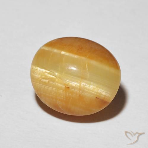 Ópalo ojo de gato Marrón-oro natural de 7.16 ct, Ovalada, Opaco