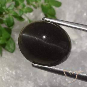 Escapolita Ojo de Gato Marrón oscuro natural de 5.07 ct, Ovalada, Translúcido