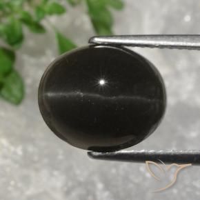 Escapolita Ojo de Gato Marrón oscuro natural de 5.07 ct, Ovalada, Translúcido