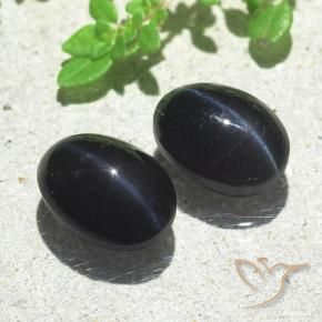 Gemas de Escapolita Ojo de Gato Negro natural de 6.03 ct, Ovalada, Translúcido