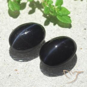 Gemas de Escapolita Ojo de Gato Negro natural de 6.03 ct, Ovalada, Translúcido