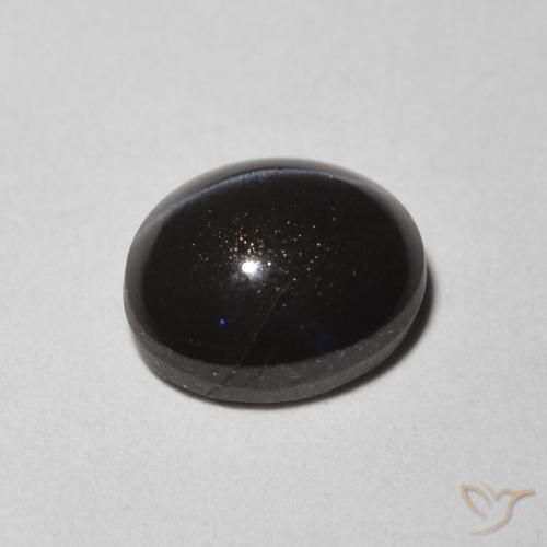 Escapolita Ojo de Gato Negro natural de 1.47 ct, Ovalada, Translúcido