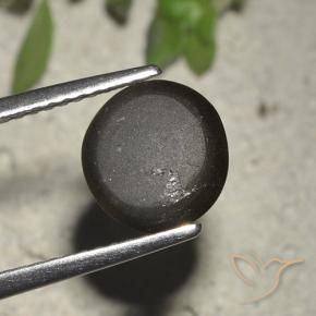 Cat's eye scapolite negro natural de 2,72 ct, corte redondo, translúcido
