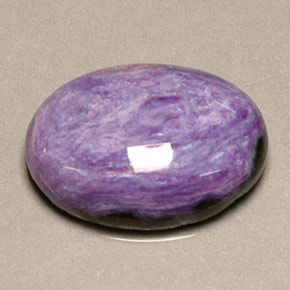 Charoíta violeta natural de 9,97 ct, corte óvalo, opaco