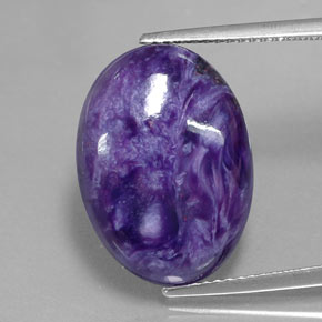 Charoíta violeta natural de 9,60 ct, corte óvalo, opaco