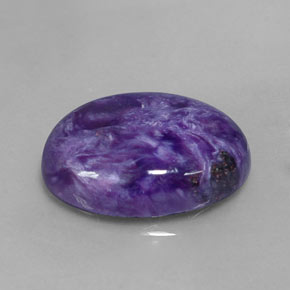 Charoíta violeta natural de 9,60 ct, corte óvalo, opaco