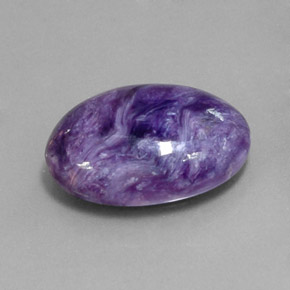 Charoíta violeta natural de 9,57 ct, corte óvalo, opaco