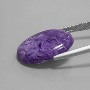 Charoíta violeta natural de 14,42 ct, corte óvalo, opaco