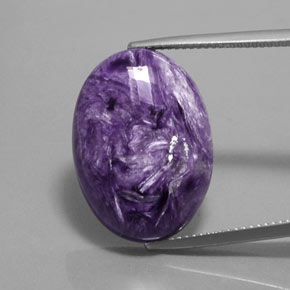 Charoíta violeta natural de 16,35 ct, corte óvalo, opaco