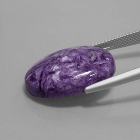 Charoíta violeta natural de 16,35 ct, corte óvalo, opaco
