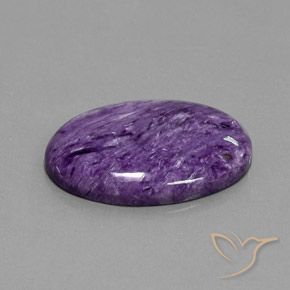 Charoíta Violeta oscuro natural de 29.06 ct, Ovalada, Opaco