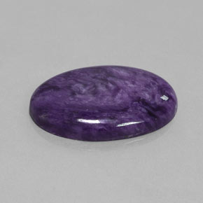 Charoíta violeta natural de 28,06 ct, corte óvalo, opaco