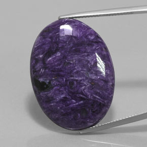 Charoíta violeta natural de 28,54 ct, corte óvalo, opaco