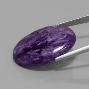 Charoíta violeta natural de 27,90 ct, corte óvalo, opaco