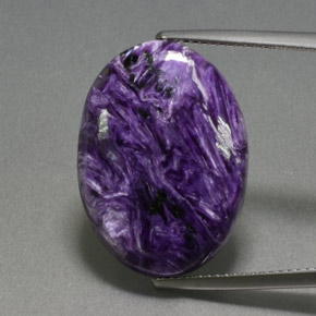 Charoíta violeta natural de 13,86 ct, corte óvalo, opaco